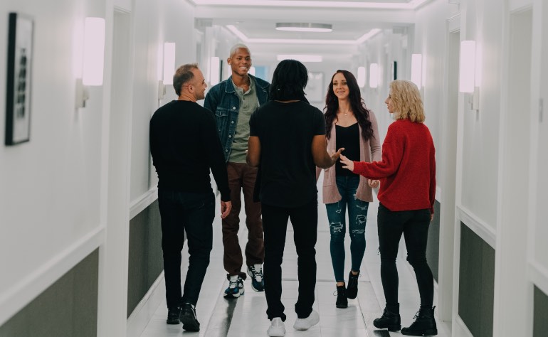 Group in hallway at Evolve Recovery Center Millbury