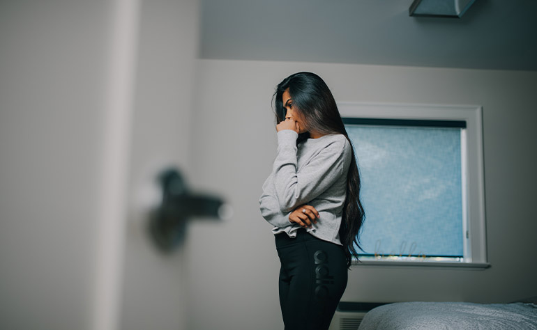 Woman client in her chamber coping with depression outcomes.